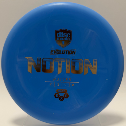Blue disc with 'Discmania' branding and 'Evolution Notion' text on a neutral background